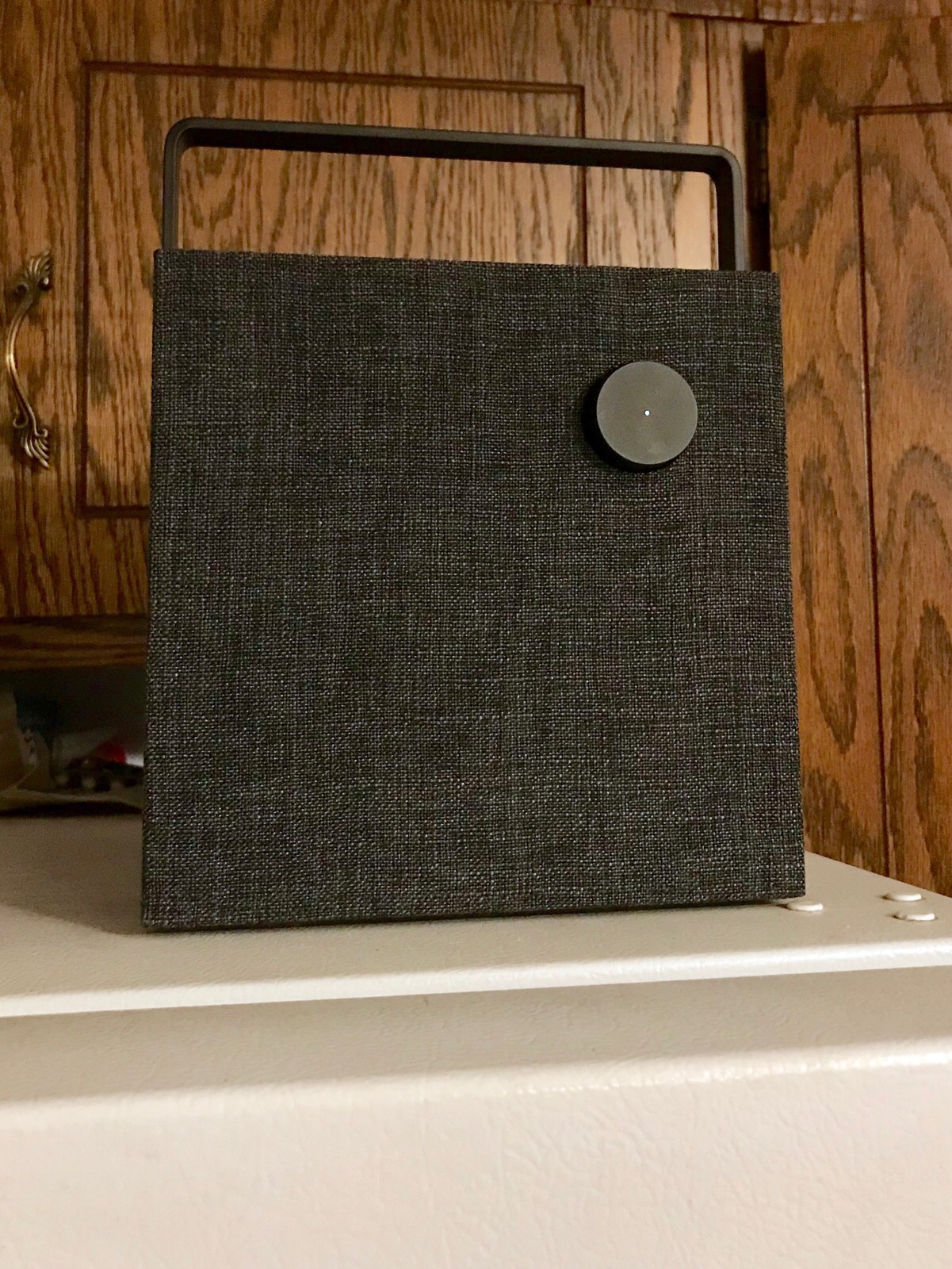The speaker fits very nicely on top of our refigerator